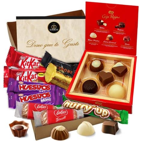 Set de Regalo VIP con Caja Roja de Nestlé, 14 Bombones y Chocolates Toblerone, Kit Kat, Galletas Lotus Biscoff, Huesitos y Chocolate Hurry Up · Incluye Tarjeta Personalizada.